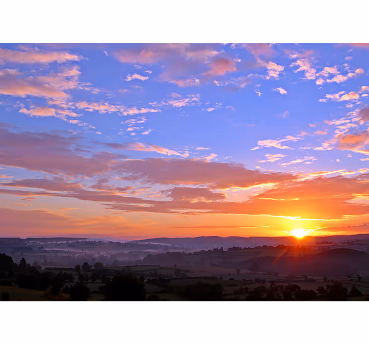 Fototapete landschaft sonnenuntergang über hügel - TenStickers