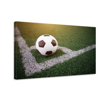 Leinwandbild Jugendliche Schöner fußball auf rasen - TenStickers