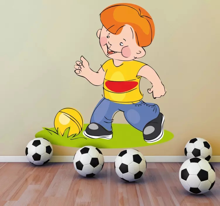 Wandtattoo Fußball Junge beim Ballspielen - TenStickers