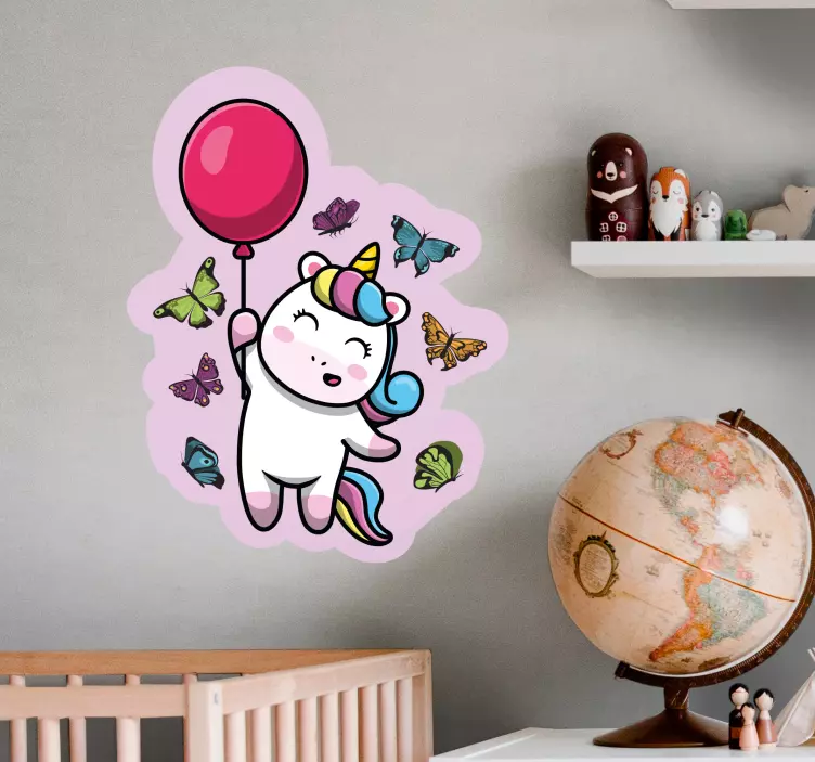 Wandtattoo Kinderzimmer verspieltes einhorn mit ballon - TenStickers