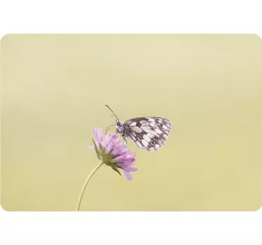 Laptop Aufkleber schmetterling auf blume - TenStickers