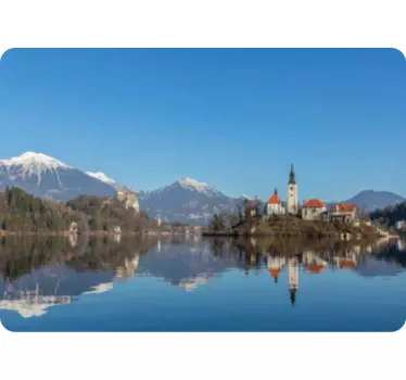 Laptop Sticker mit Bergen und Dorf mit Spiegelung im Wasser - TenStickers
