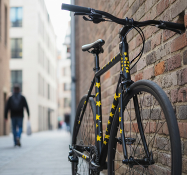 Fahrrad aufkleber gelbe sternblitze grafik - TenStickers