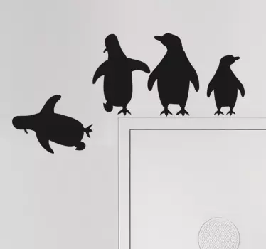 Pinguine springen glastür aufkleber - TenStickers