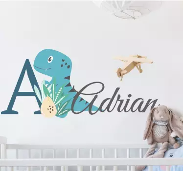Wandtattoo baby blauer dinosaurier mit namen - TenStickers